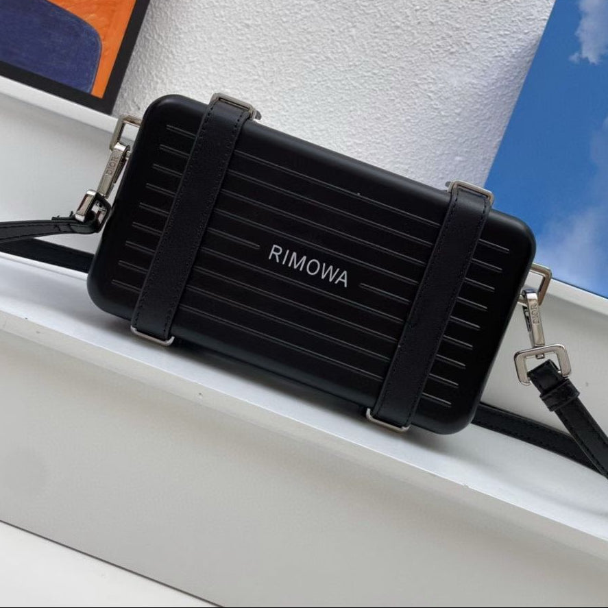 DIOR and RIMOWA Personal Clutch On Strap