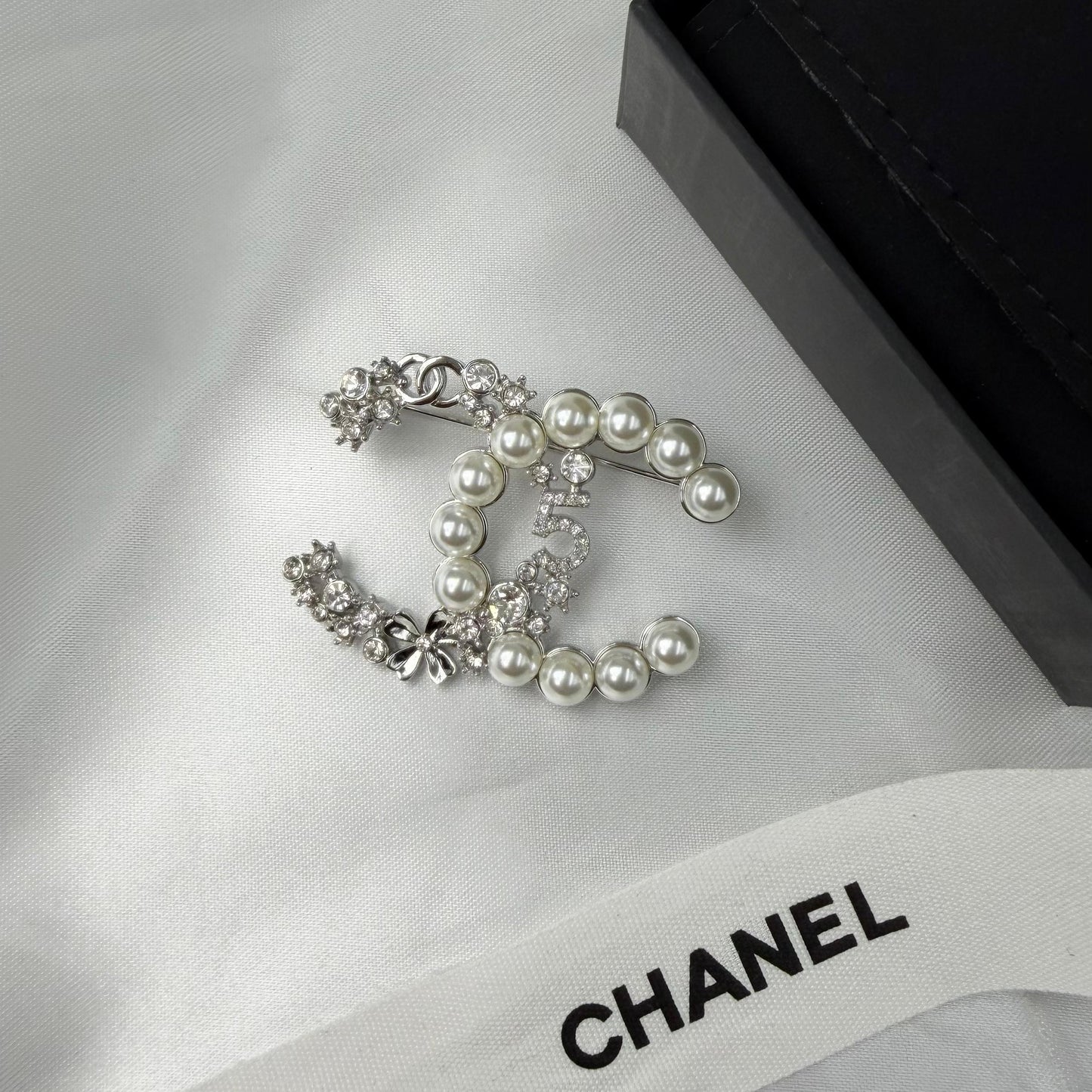 Chanel CC Brooches