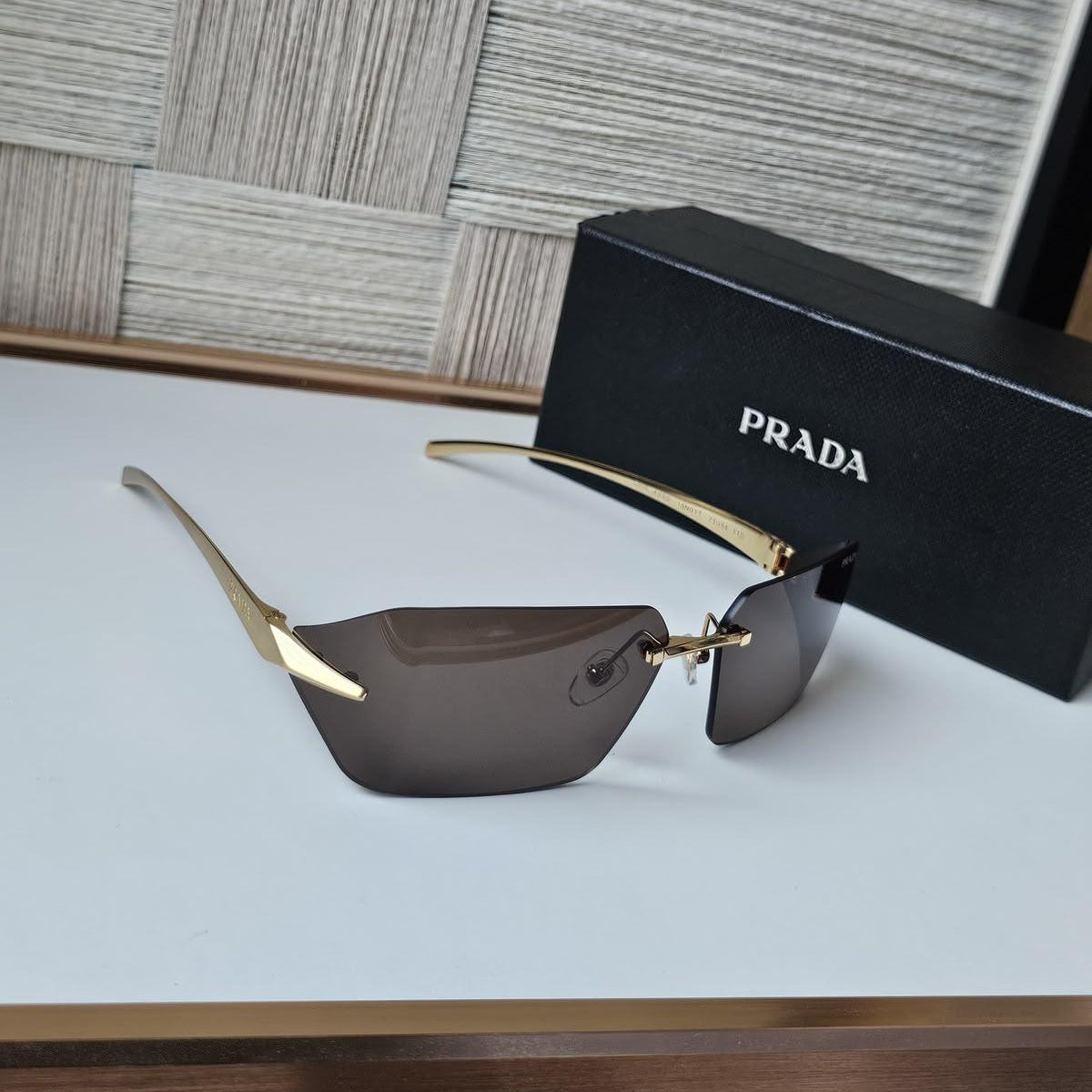 Prada Runway Rimless Sunglasses