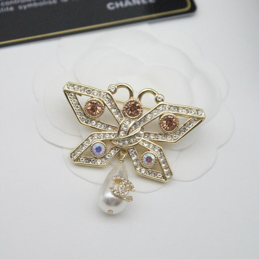Chanel CC costume brooches