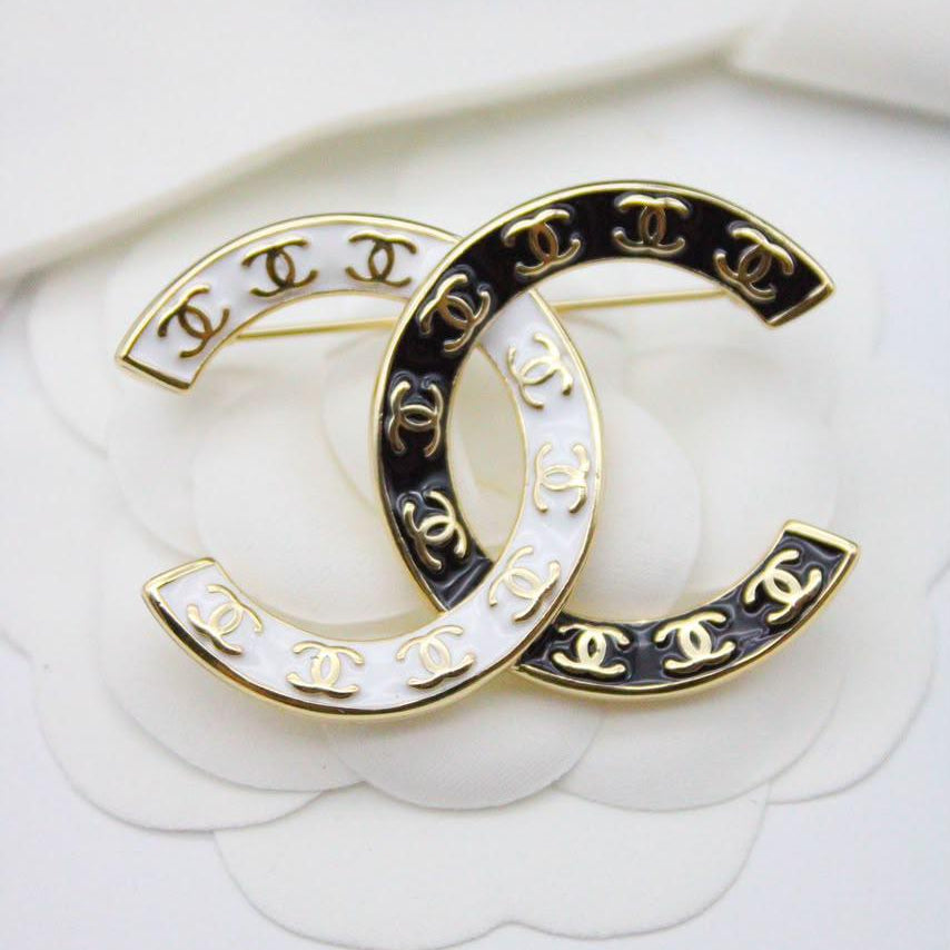 Chanel CC costume brooches