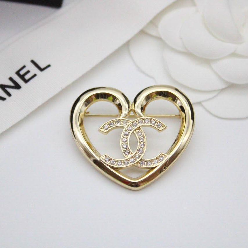 Chanel CC costume brooches