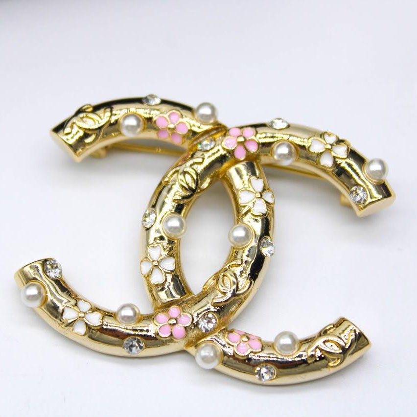 Chanel CC costume brooches