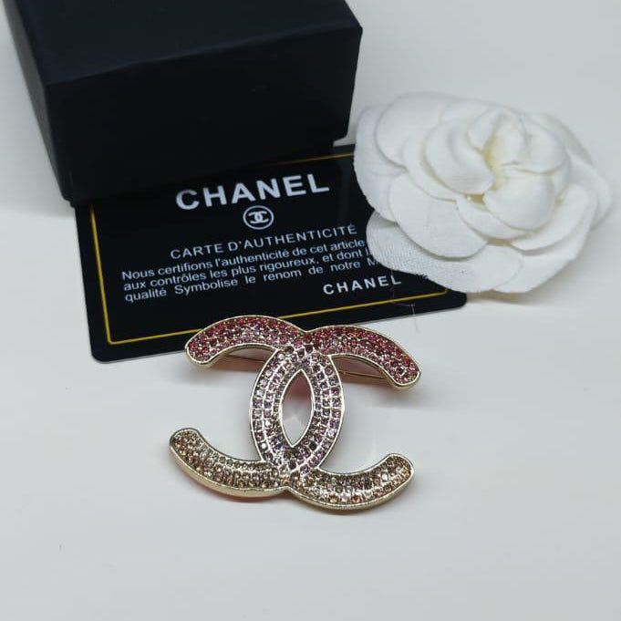 Chanel CC costume brooches