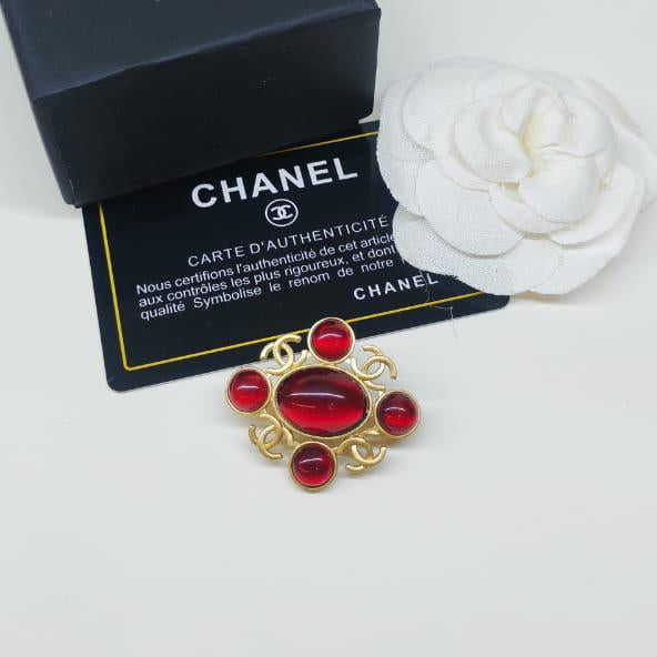 Chanel CC costume brooches