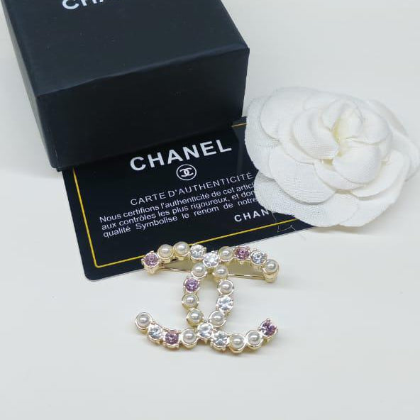 Chanel CC costume brooches