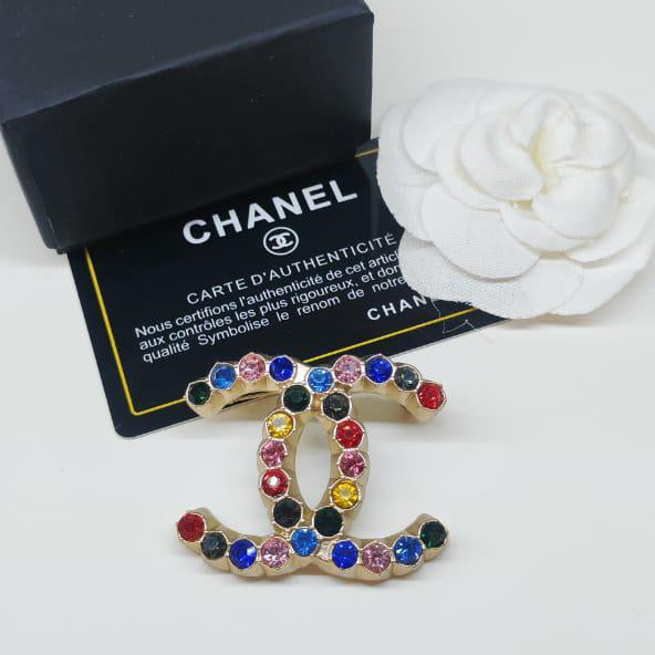 Chanel CC costume brooches