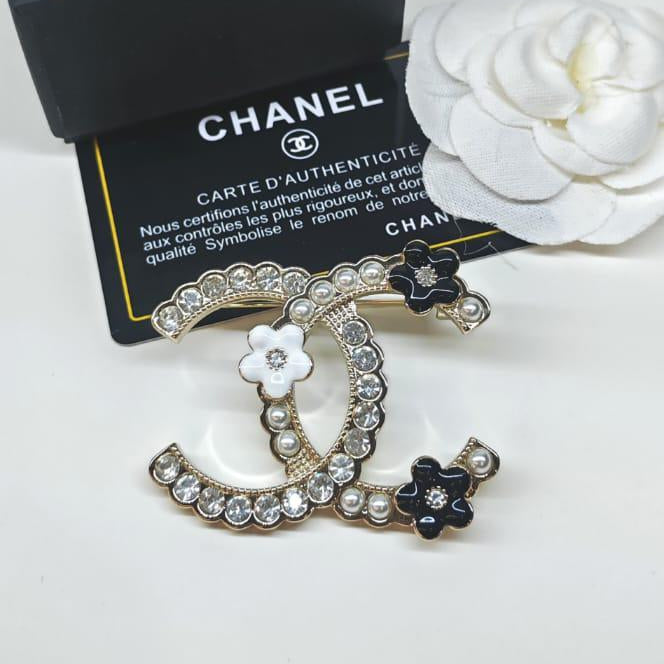 Chanel CC costume brooches