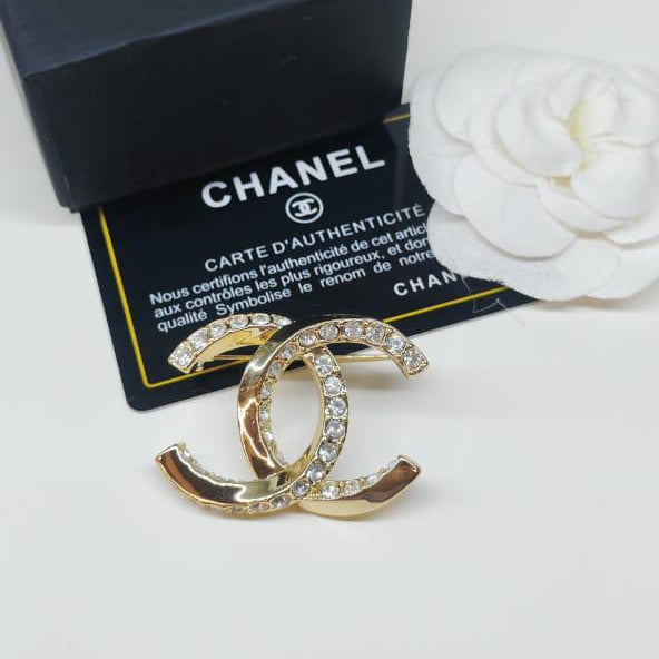 Chanel CC costume brooches