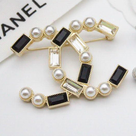 Chanel CC costume brooches