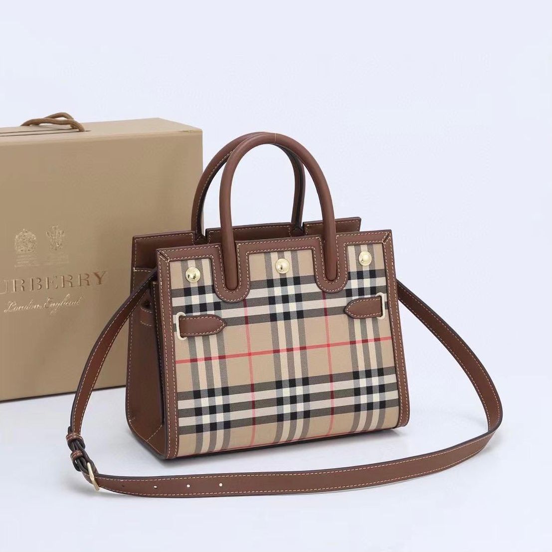 Burberry mini leather and discount vintage check title bag